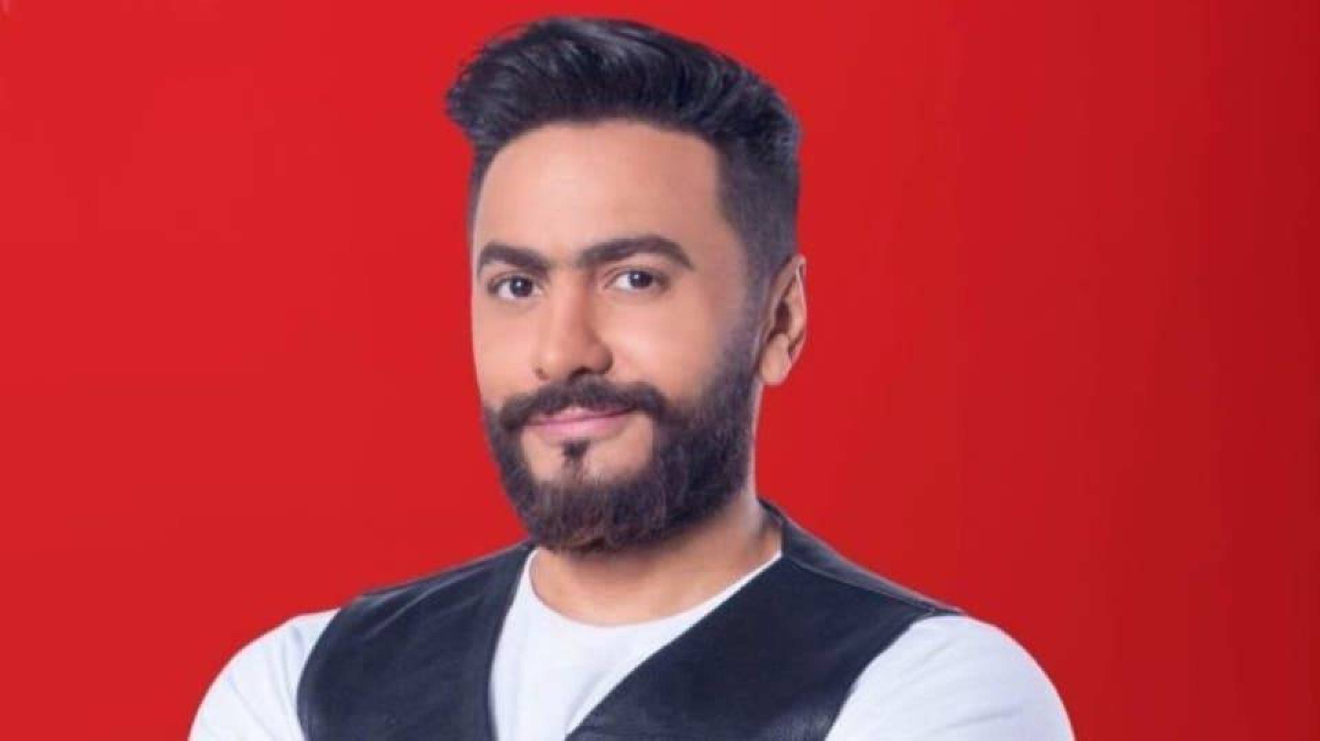 رئيس الشركة المنتجة لأغنية تامر حسني يكشف أن أرباح الأغنية ستعود لعلاج لاعب الأهلي
