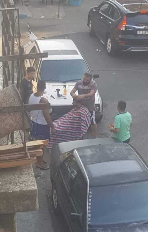 حلاقة في الشارع
